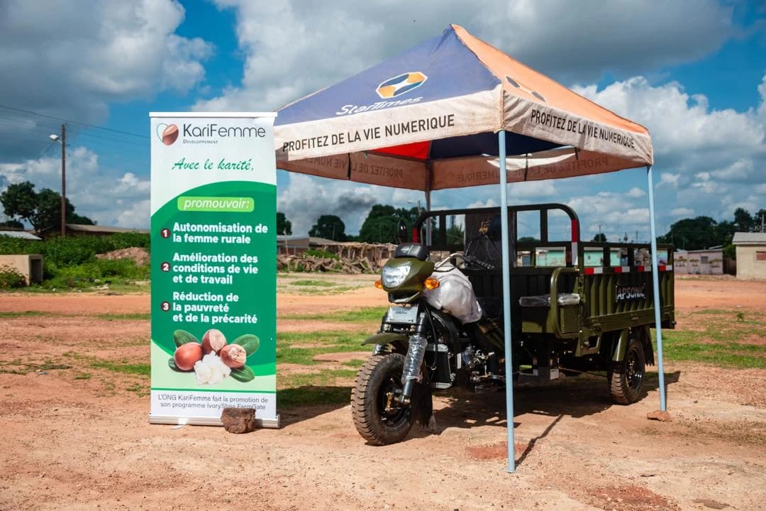 Tricycle de transport et kakémono du programme IvoryShea FarmGate